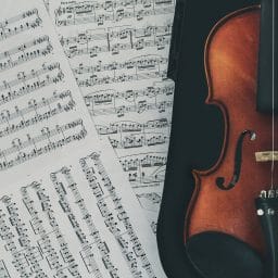 Violin and music pages.