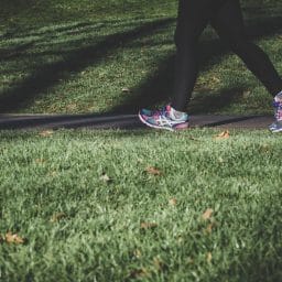 Close-up of a woman going for a walk in the park.